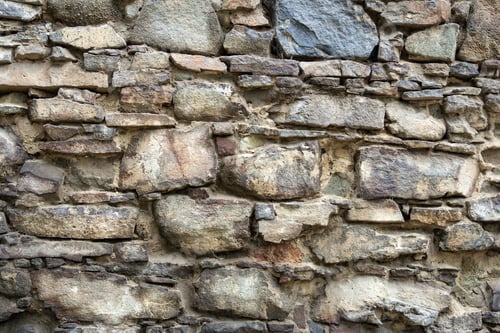 Vorschau: Unregelmäßige Textur der alten Steinmauer draußen