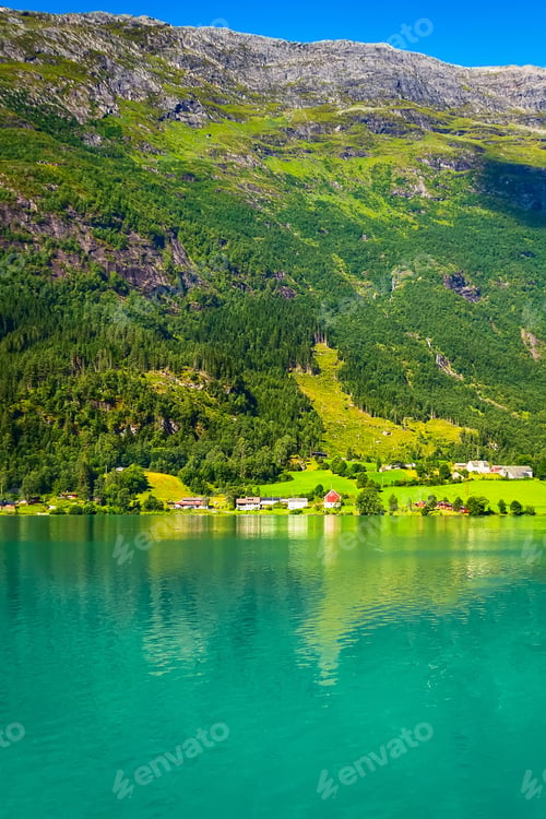 Preview: Norwegian Village Landscape With Fjord, Mountains And Colorful Houses In Olden, Norway