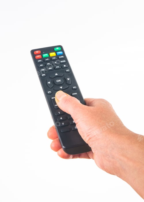 Preview: Hand Holding A Remote Control On White Background