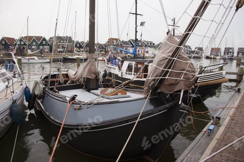 Preview: Wooden Boats And Yachts Anchored In Harbor, Wooden Houses On Quay