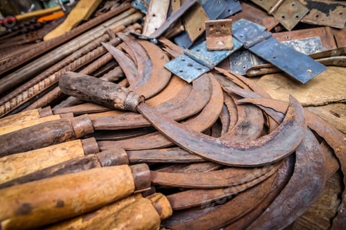 Preview: Old Rusted Scythes For Sale On The Market In Madagascar