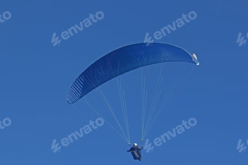 Preview: Paraglider Flying Blue Wing