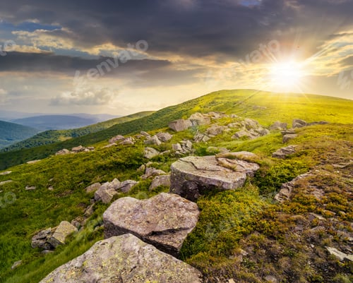 Preview: Landscape With White Sharp Boulders On The Hillside Near Mountain Peak In Evening Light