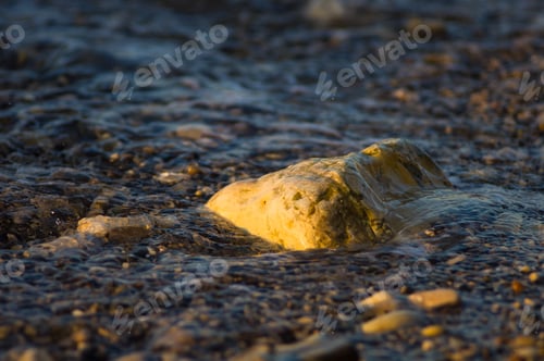 Preview: Pebble Stones On The Sea Beach, The Rolling Waves Of The Sea With Foam