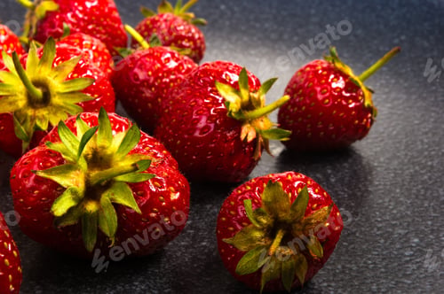 Preview: Fresh Ripe Berries Strawberries On Black Ceramic Plate On White Background