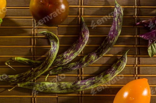 Preview: Autumn Still Life - Asparagus Beans, Purple Basil, Yellow And Chocolate Tomatoes On Bamboo Mat