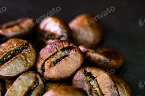 Preview: Brown Roasted Coffee Beans On Black Background, Close Up, Macro