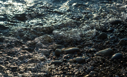 Preview: Pebble Stones On The Sea Beach, The Rolling Waves Of The Sea With Foam