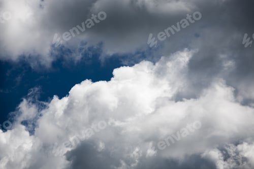 Preview: Beautiful, Fluffy, White And Grey Clouds And Blue Sky
