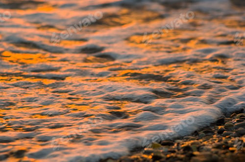 Preview: Pebble Stones On The Sea Beach, The Rolling Waves Of The Sea With Foam