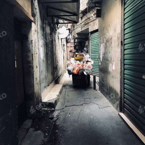 Preview: A Cart Full Of Plastic Bottles In A Narrow Street In The Old District Of Shenzhen, Guangdong, China