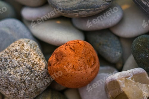 Preview: Boulders And Colorful Pebbles On The Beach