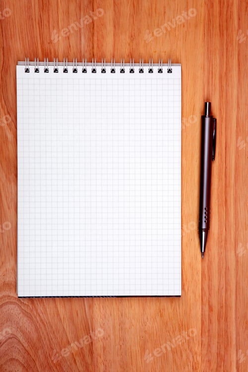 Preview: Blank Writing Pad And Pen On The Table