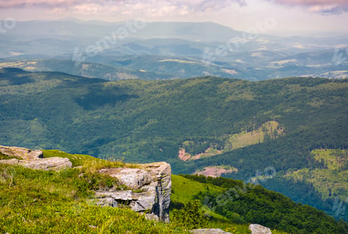 Preview: Rocky Cliff Over The Valley With Rolling Hills. Lovely Mountainous Scenery With Deep Perspective