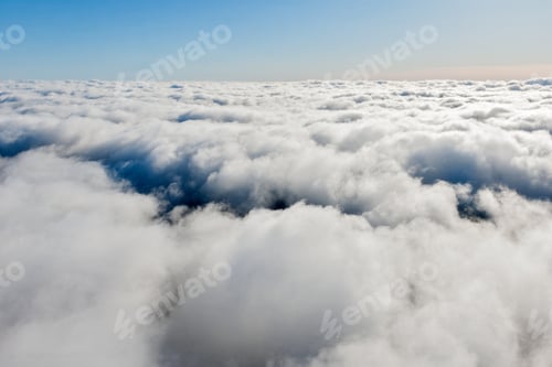 Preview: Aerial View From Airplane Over The Clouds And Sky