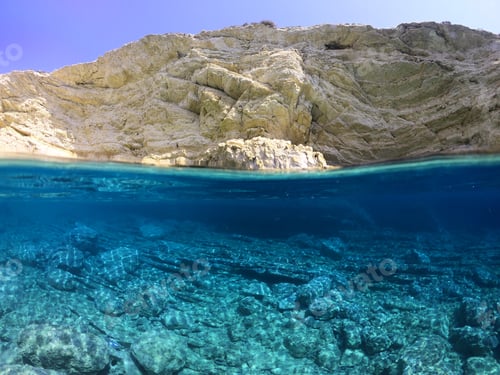 Preview: Above And Below Underwater Photo Of Crystal Clear Sea Paradise Rocky Seascape Of Laki Beach In Kato