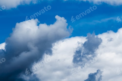 Preview: Beautiful, Fluffy, White And Grey Clouds And Blue Sky