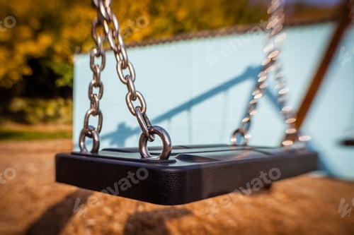 Preview: Picture Of An Swing In An Outdoor Playground