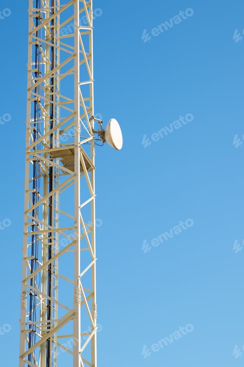 Preview: Telecommunications Tower With Clear Blue Sky.