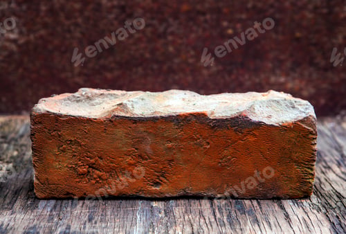 Preview: Old Brick Closeup On The Wooden Table