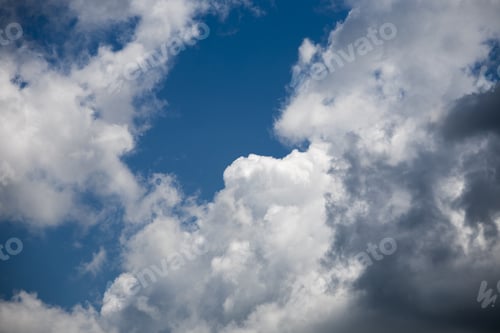 Preview: Beautiful, Fluffy, White And Grey Clouds And Blue Sky