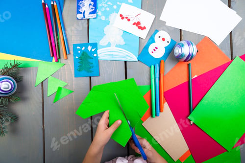 Preview: Child Hands Make Handmade Christmas Toys From Cardboard. Children'S Diy Concept