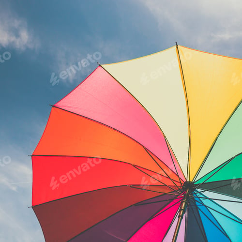 Preview: Open Colorful Rainbow Umbrella On Blue Sky Background, Vintage Look