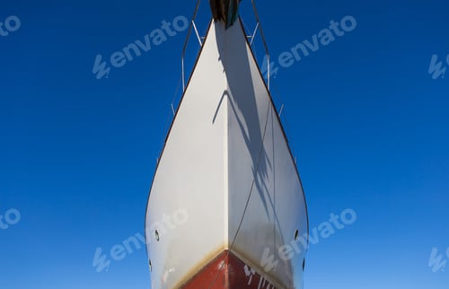 Preview: Close Up Of Front Side Of Big Ship In Port. Ship Trunk On Blue Sky Background