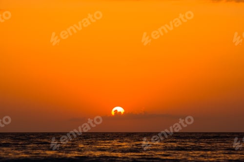 Preview: Amazing Sea Sunset On The Pebble Beach, The Sun, Waves, Clouds