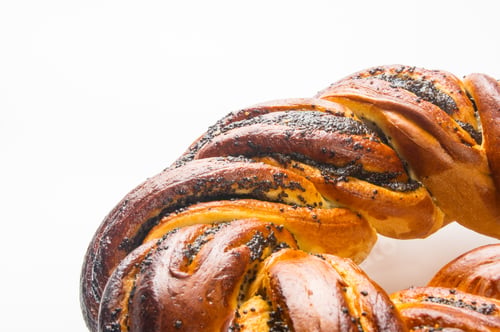 Preview: Braided Poppy Seed Round Loaf On White Background