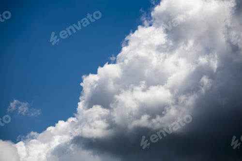 Preview: Beautiful, Fluffy, White And Grey Clouds And Blue Sky