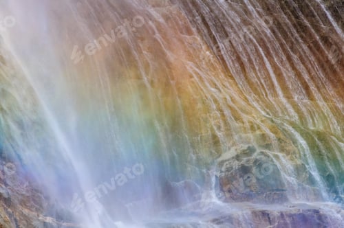 Preview: A Telephoto Shot Of Water Being Deflected By A Rock In The Upper Yosemite Falls, With A Rainbow