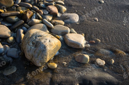 Preview: Pebble Stones On The Sea Beach, The Rolling Waves Of The Sea With Foam
