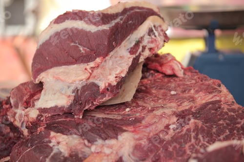 Preview: Food Preparation Detail - Fresh Red Beaf Meat With White Fat Close Up, Lying Down On The Street