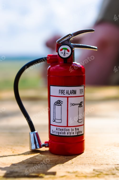 Preview: Red Fire Extinguisher On A Wooden Table, Concept