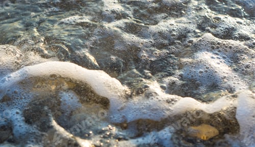 Preview: Pebble Stones On The Sea Beach, The Rolling Waves Of The Sea With Foam