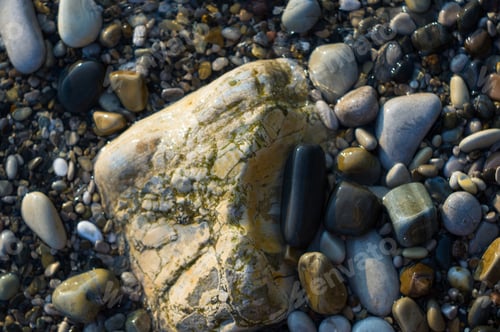 Preview: Pebble Stones On The Sea Beach, The Rolling Waves Of The Sea With Foam