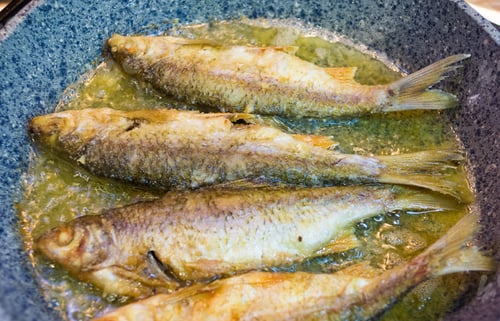Preview: Fried River Fish With Crispy Crust In A Frying Pan, Homemade Dish, Close Up