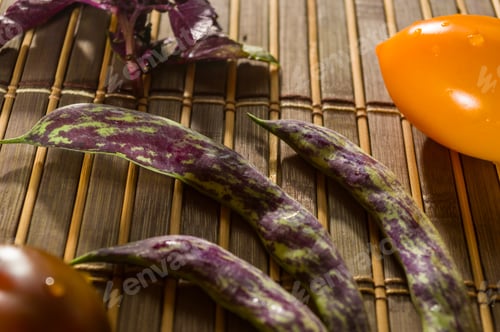Preview: Autumn Still Life - Asparagus Beans, Purple Basil, Yellow And Chocolate Tomatoes On Bamboo Mat