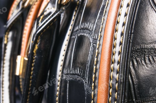 Preview: Closeup Of Buckles, Clasps, Zippers, Pockets, Fasteners, Fittings And Seams On Black Leather Hand