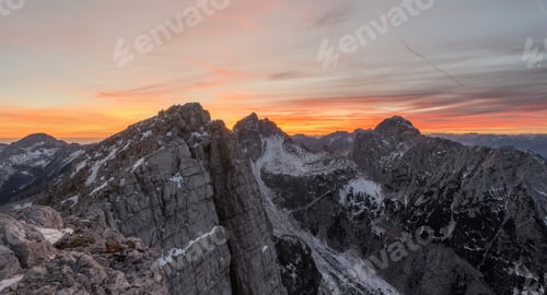 Preview: Sunset In The Mountains With Hikers Resting At The Top