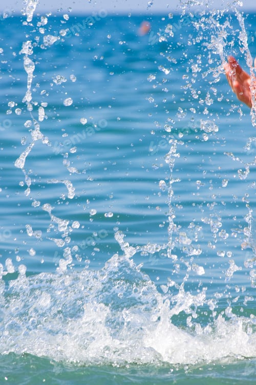Preview: Large Transparent Splashes Sea Water On A Sunny Day