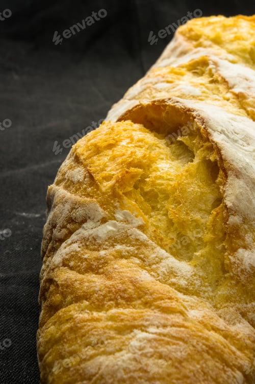 Preview: Fresh Loaf Of White Wheat Bread On Black Background