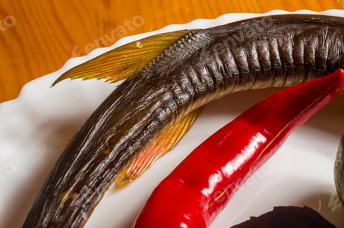 Preview: Smoked Garfish With Lime, Basil, Green Onions, Chili, Nori Chips, Spices, Olive Oil In A White