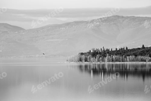 Preview: A Perfectly Symmetric View Of A Lake, With Reflections On Water