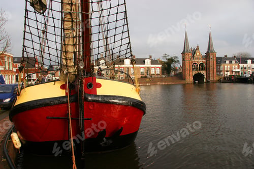 Preview: Historical Boat At Quay Near Water Gate Entrance Of Fortified City