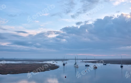 Preview: Small Boats Riding At High Tide At Sunrise