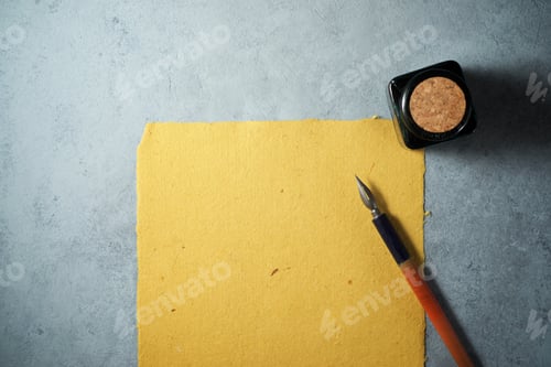 Preview: Nib Pen For Calligraphy And Inkwell On A Table.