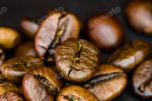 Preview: Brown Roasted Coffee Beans On Black Background, Close Up, Macro