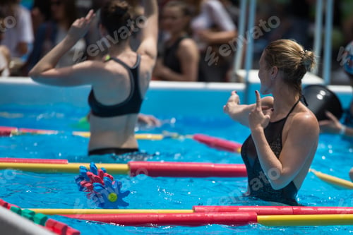 Preview: Women Doing Water Aerobics Outdoor In A Swimming Pool.